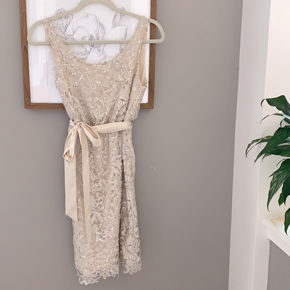 Sequin and lace cocktail dress with silk bow